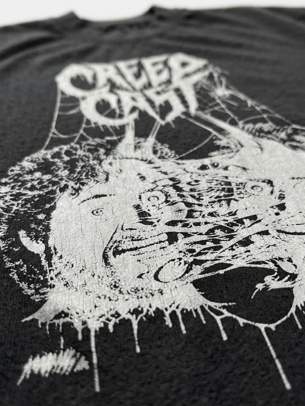 Black Short Sleeve Tee with White Creepy Face Graphic